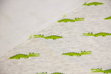 Alpenfleece mit Krokodilen, natur meliert, 0,5 m