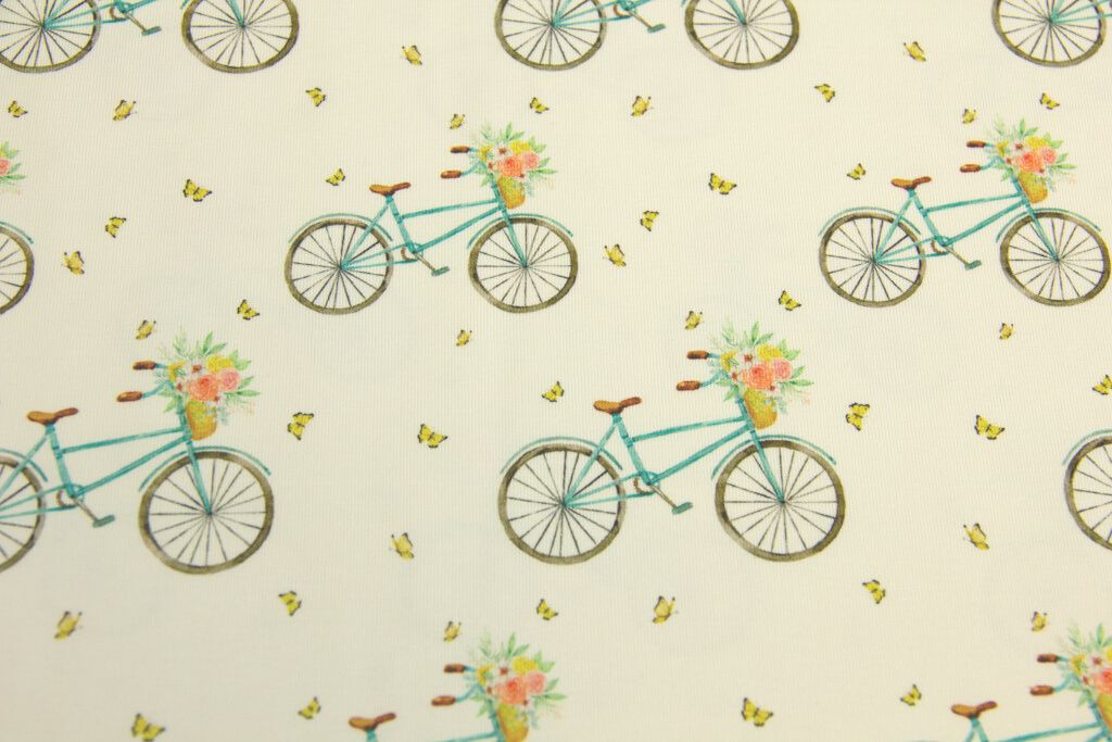 Restmenge 1 Meter Jersey mit Fahrrädern und Blumen