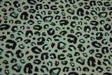 B-Ware 50 cm French Terry Leoprint, smaragd, schwarz