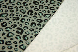 B-Ware 50 cm French Terry Leoprint, smaragd, schwarz