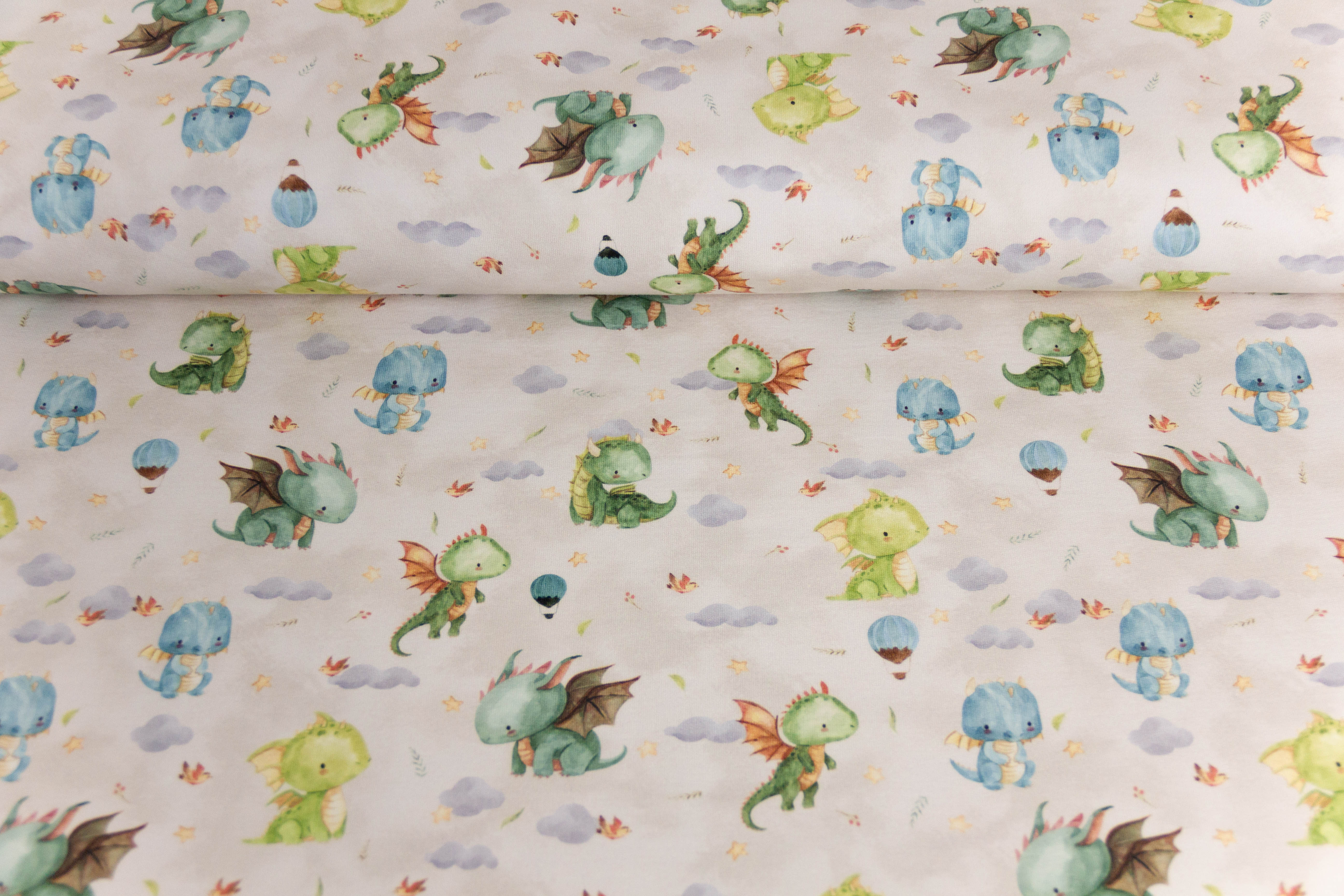French Terry mit Drachen, beige, 0,5 m