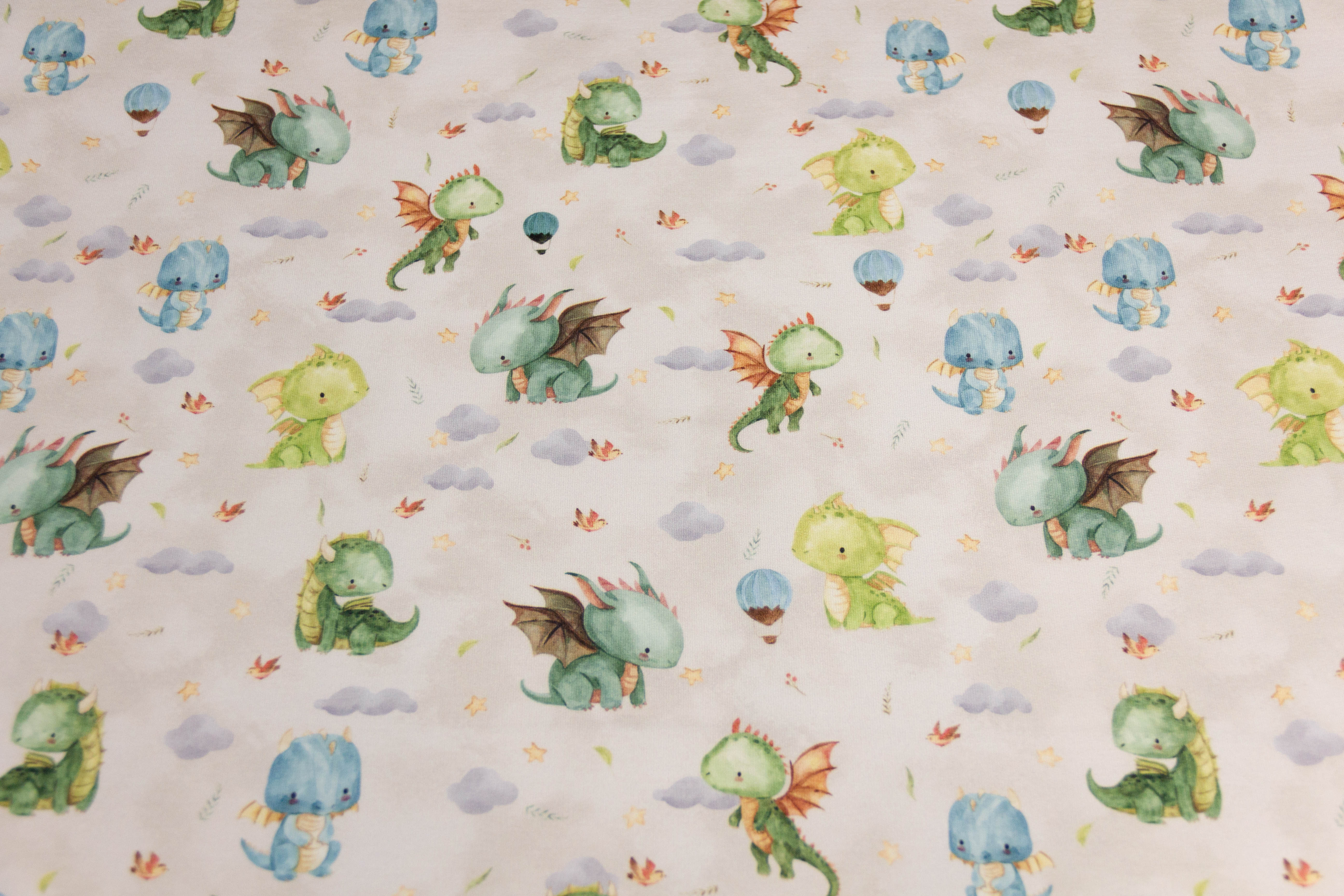 French Terry mit Drachen, beige, 0,5 m
