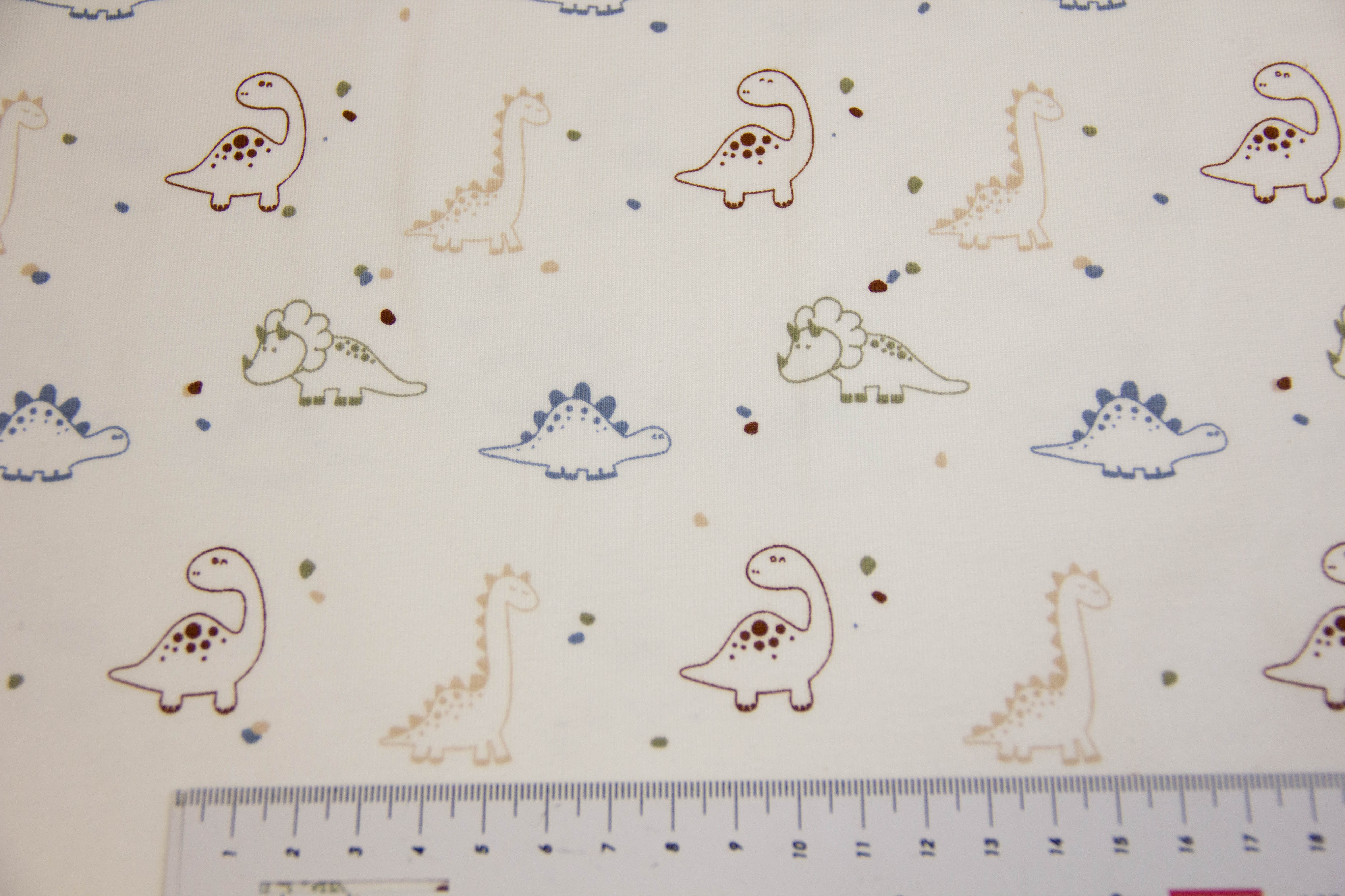 Jersey mit Dinosauriern, ecru, 0,5 m