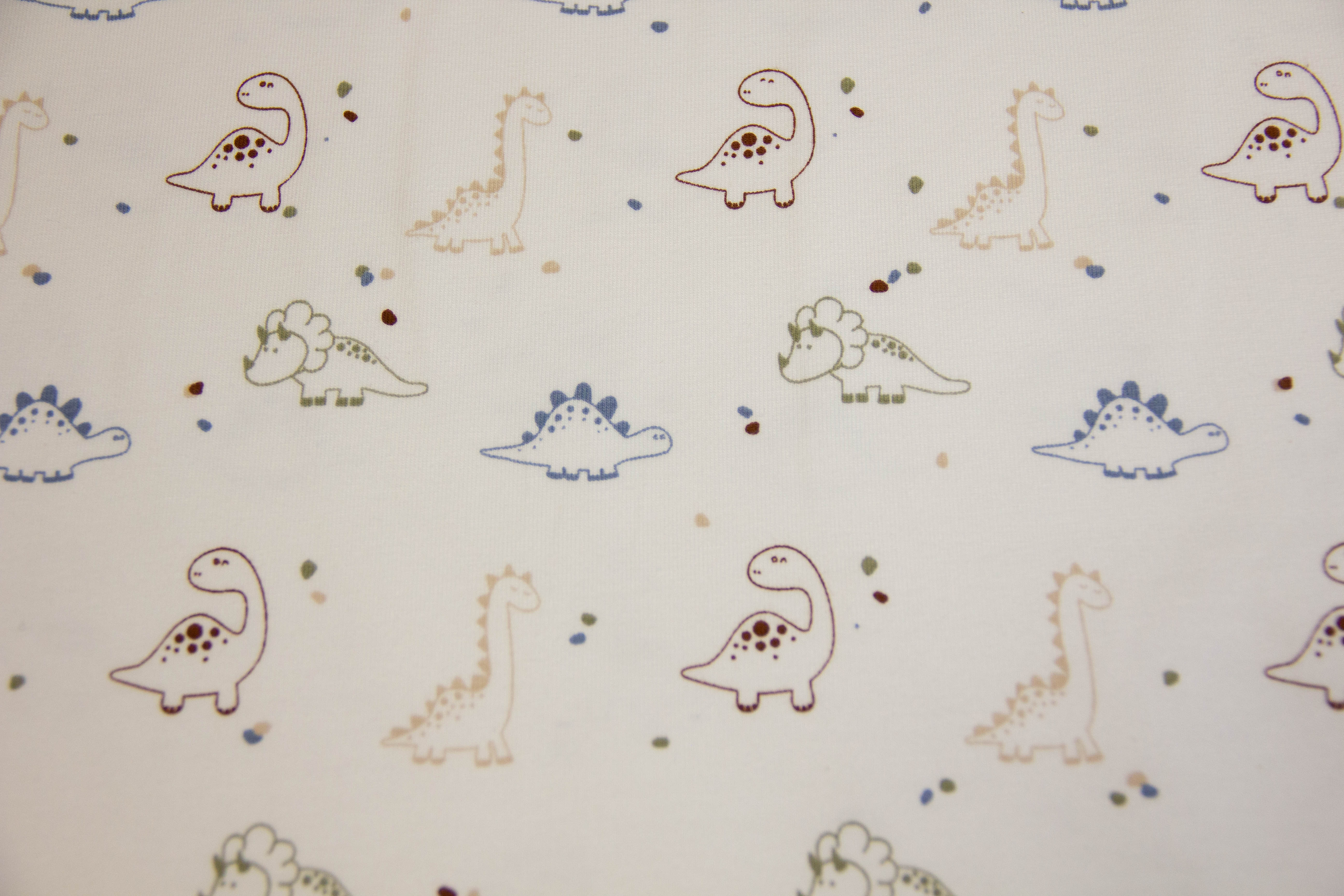 Jersey mit Dinosauriern, ecru, 0,5 m
