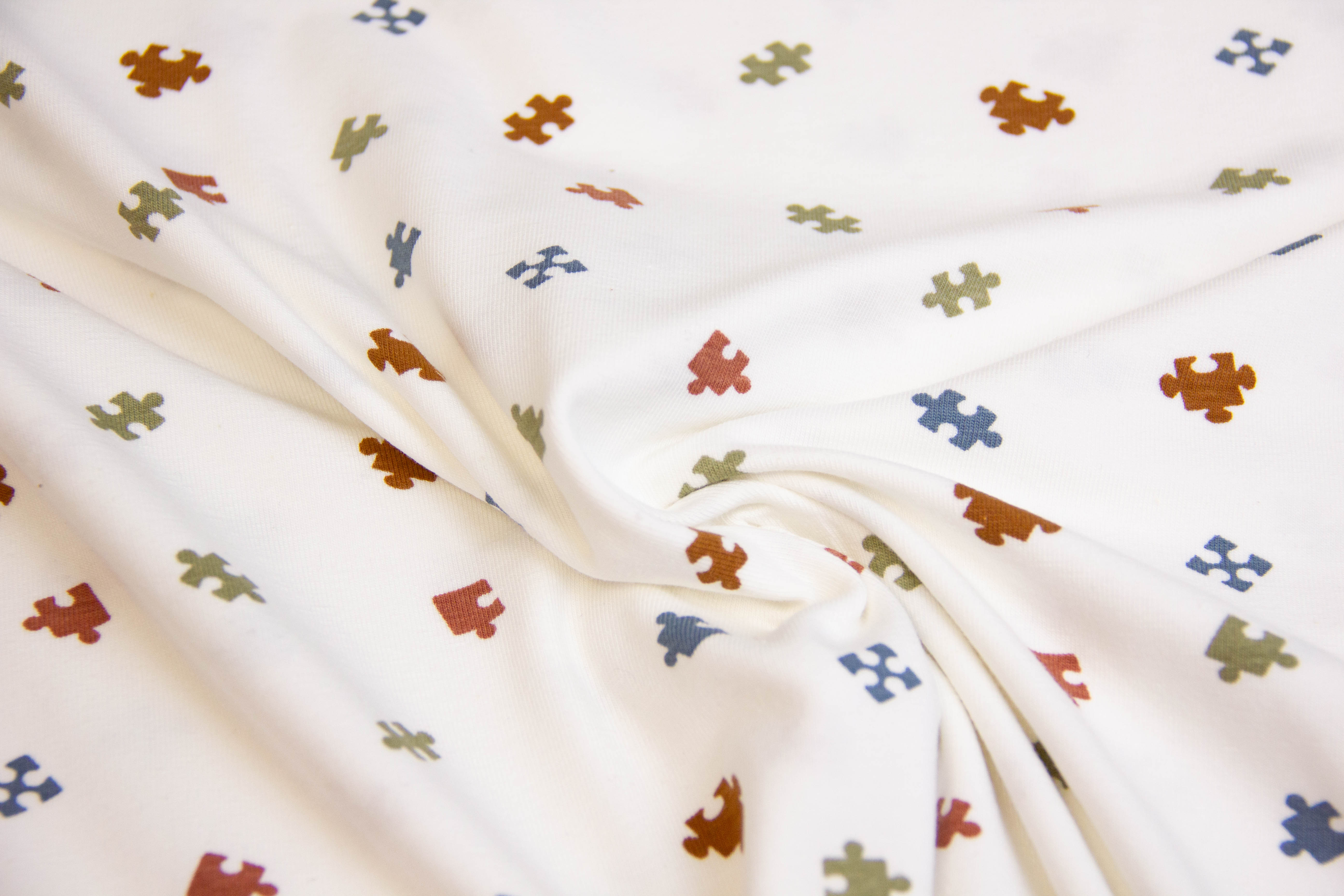 Jersey mit kleinen Puzzleteilen, ecru, 0,5 m