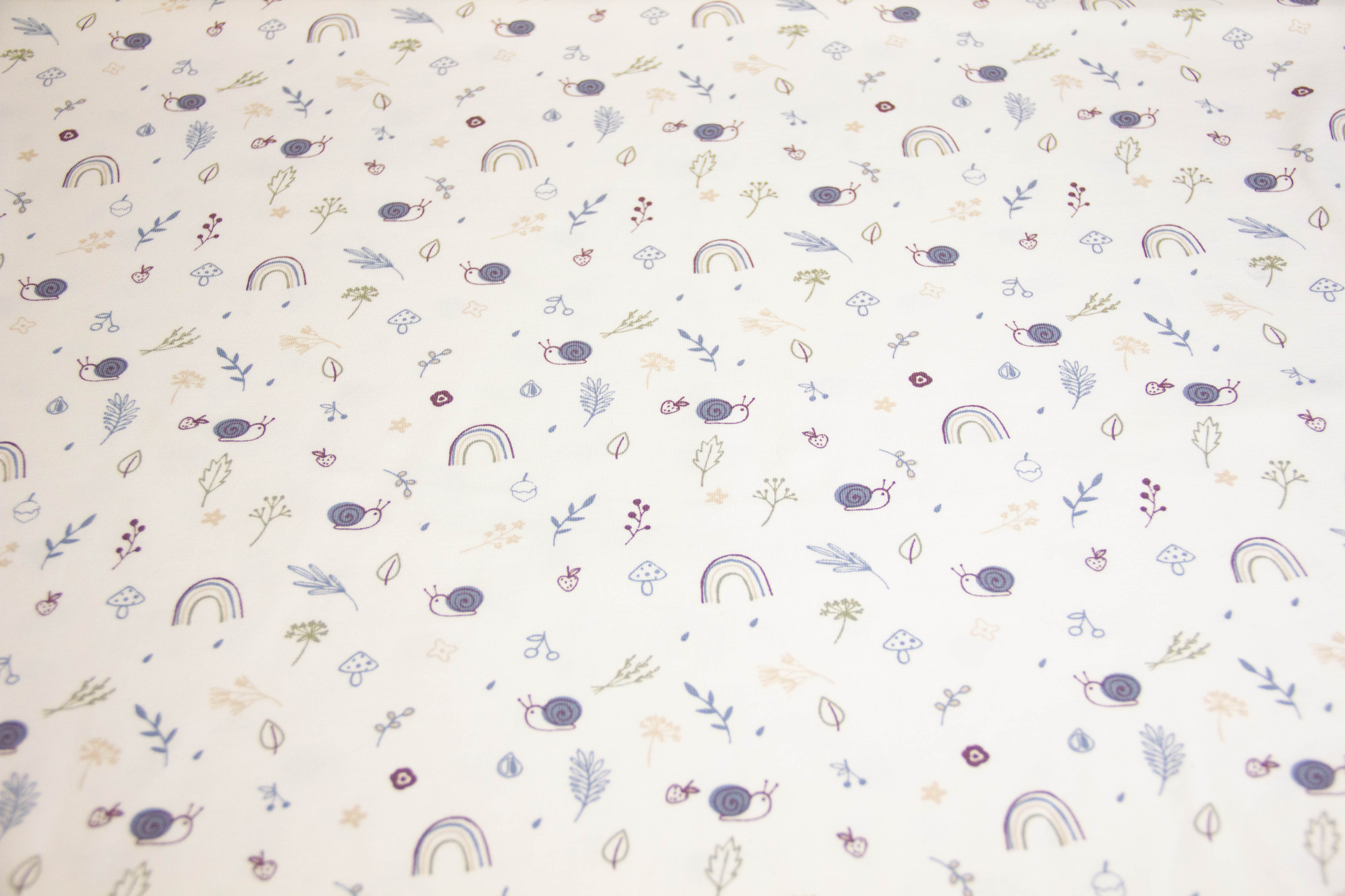Jersey mit Schnecken und Regenbogen, ecru, 0,5 m
