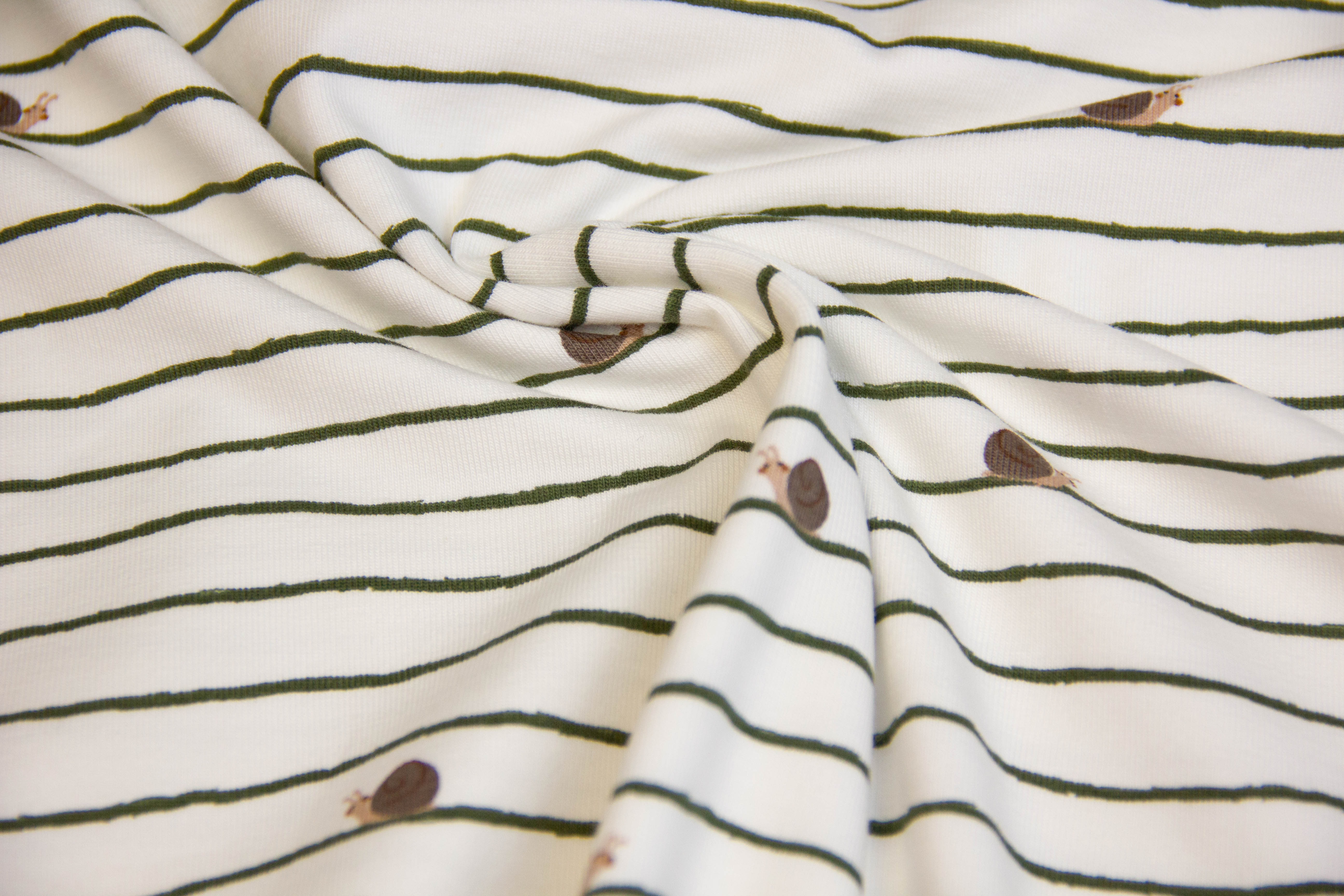 Jersey mit kleinen Schnecken, ecru, 0,5 m