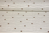 Jersey mit kleinen Schnecken, ecru, 0,5 m
