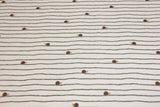 Jersey mit kleinen Schnecken, ecru, 0,5 m