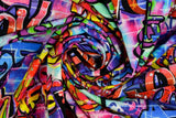 French Terry mit Graffiti, pink, 0,5 m