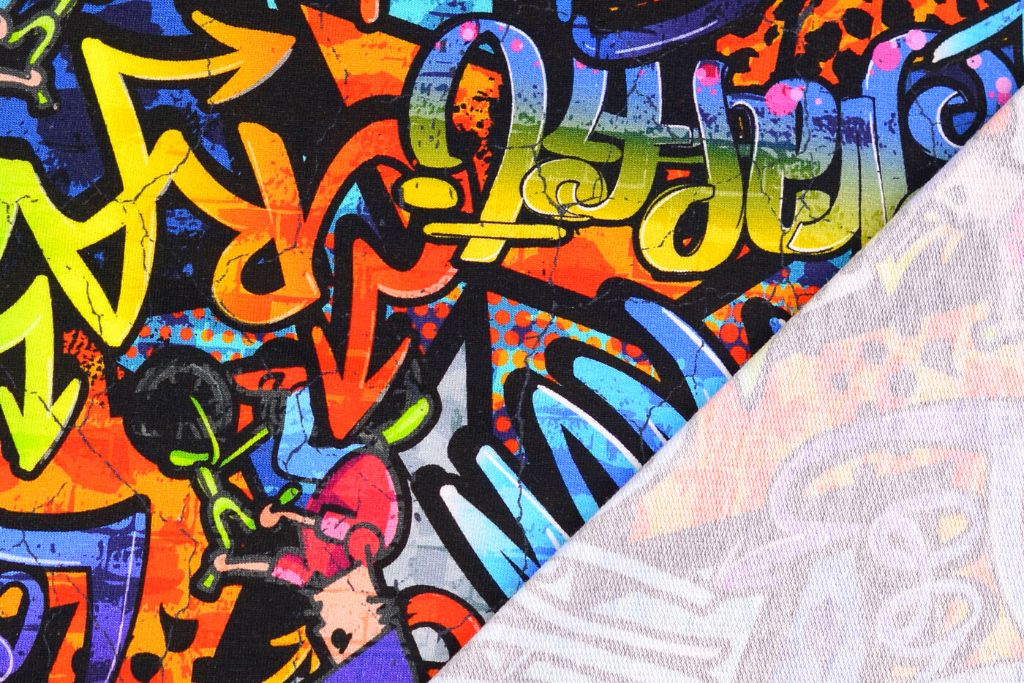 French Terry mit Graffiti, blau, 0,5 m