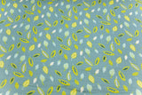 Restmenge 65 cm Musselin mit Blättern, grün/petrol, 0,5 m