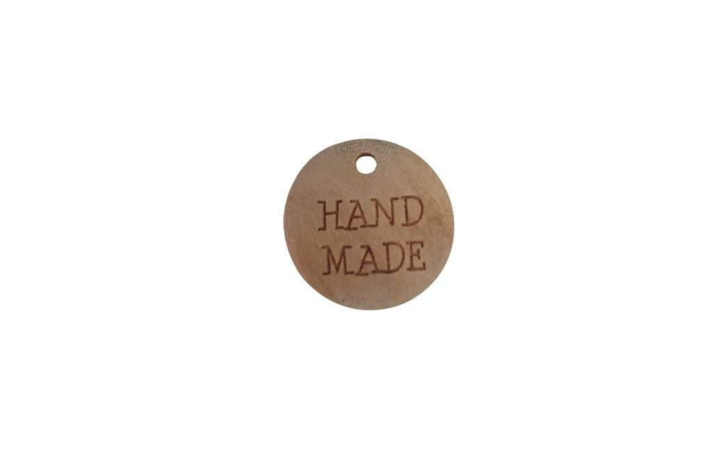 Holzzierteil mit Schriftzug "handmade"