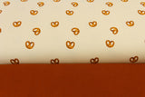 Stoffpaket Jersey + Bündchen Jersey mit Brezen, beige, kupfer